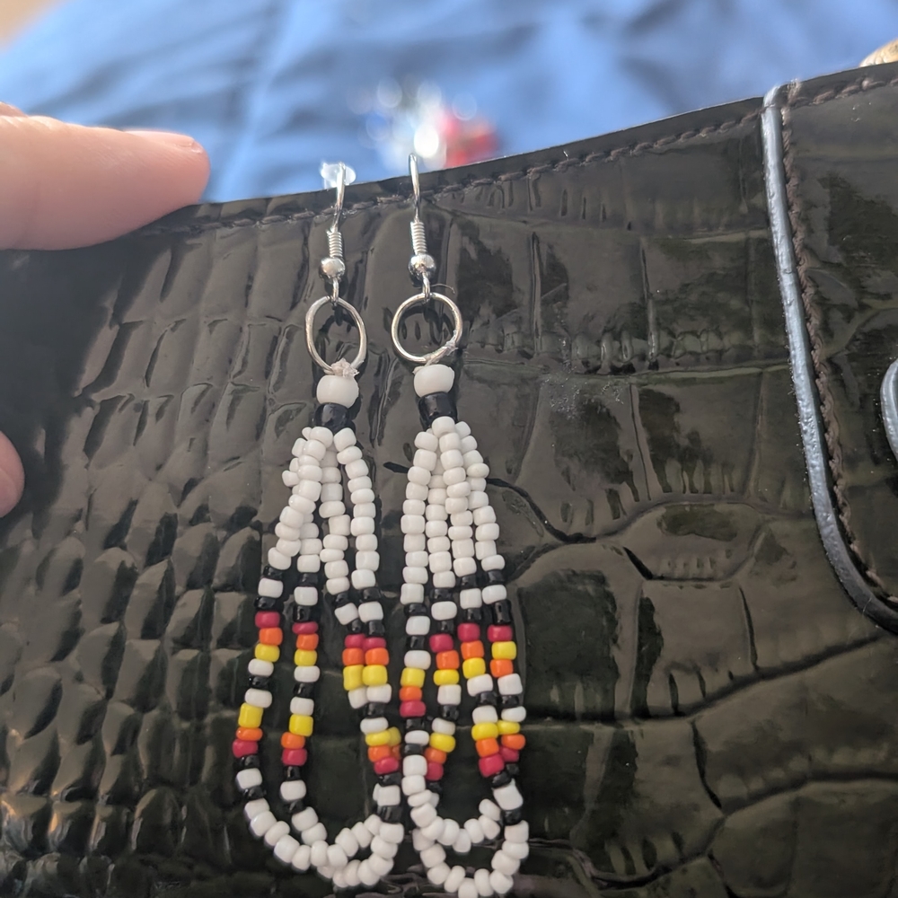 Handmade White Beaded Fringe Earrings with Red, Yellow & Black Accents